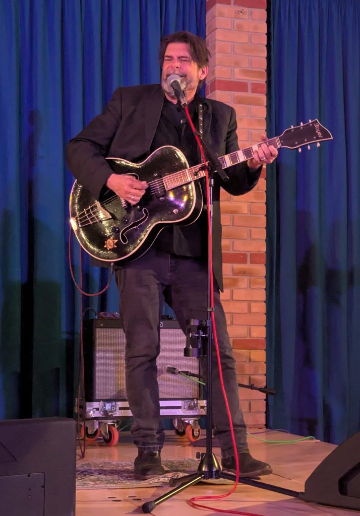 Will Sexton playing guitar and singing